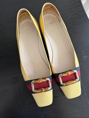 Gucci Sylvie Yellow Leather Flats with Red-and-Blue Band and Bamboo Buckle